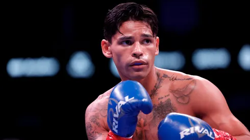 Ryan Garcia looks on while facing Oscar Duarte.