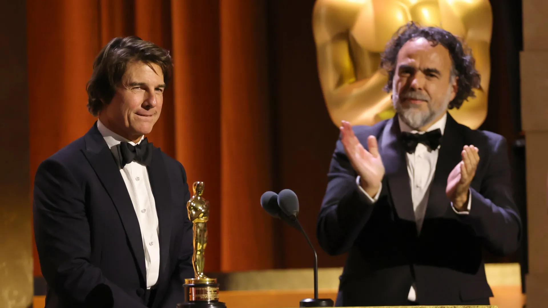 Tom Cruise accepts an Academy Honorary Award from Alejandro González Iñárritu onstage during the 16th Governors Awards at The Ray Dolby Ballroom on November 16, 2025 in Hollywood, California. (Photo by Kevin Winter/Getty Images)