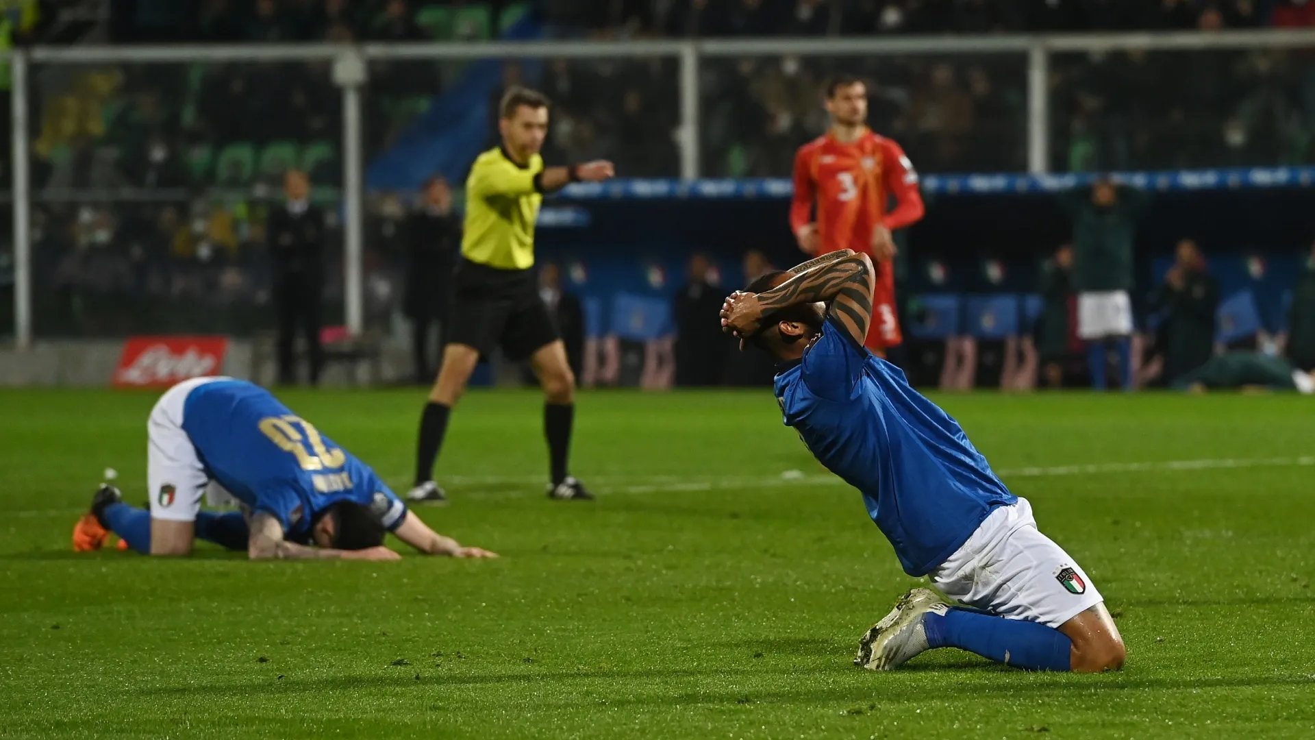 Alessandro Bastoni and Joao Pedro Galvao of Italy look dejected during North Macedonia game.